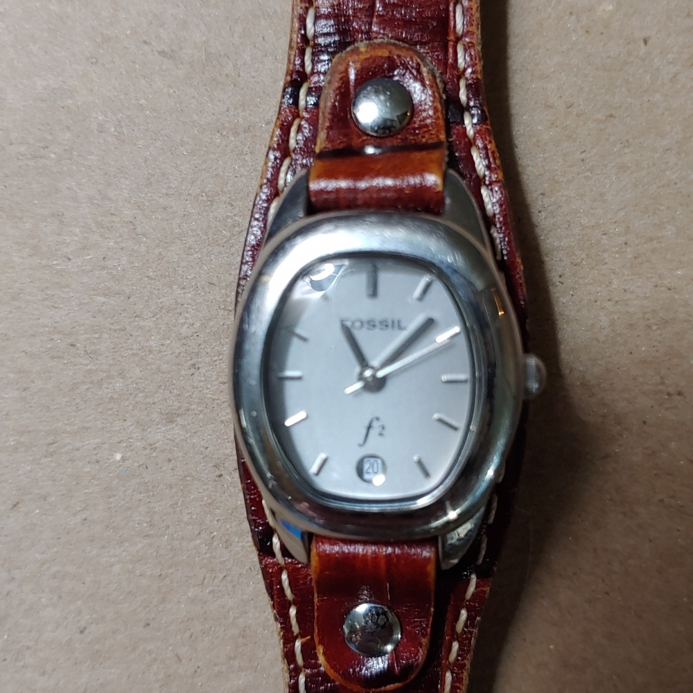 Brown Fossil F2 watch for women with new battery